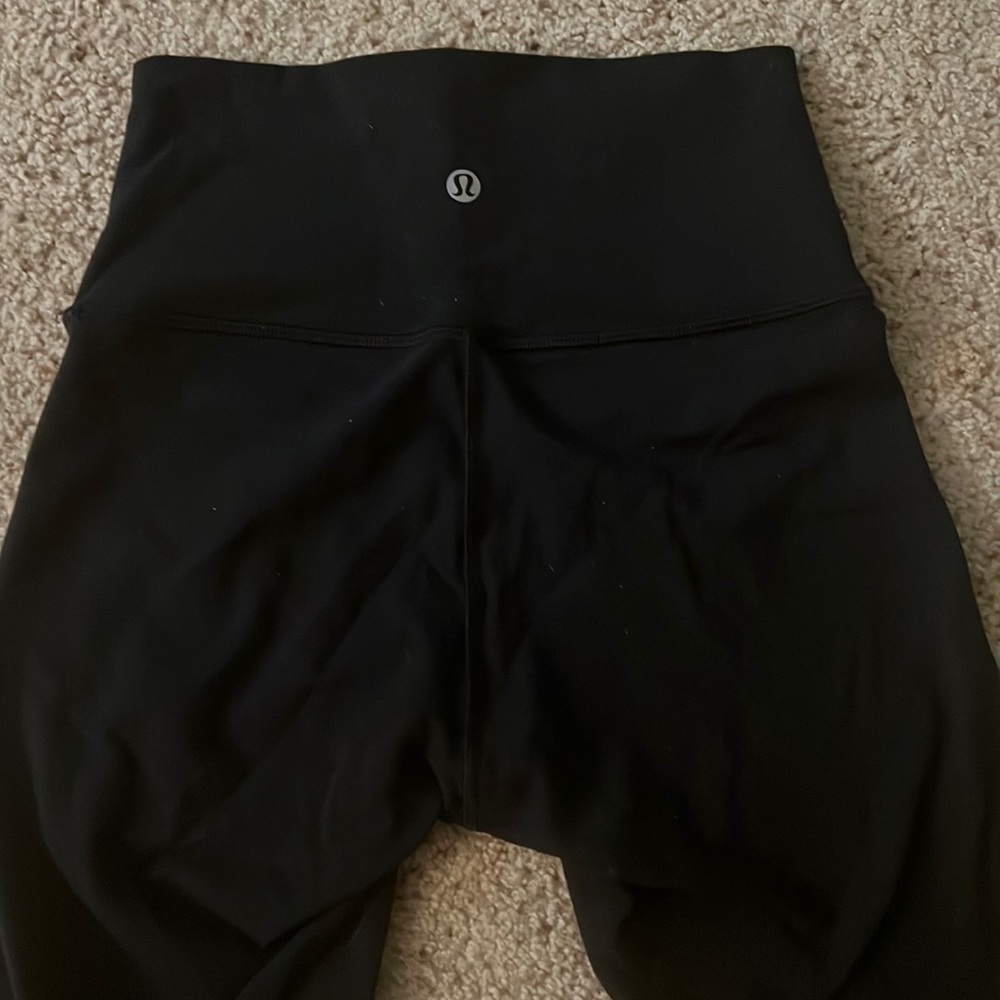 Lululemon black wunder unders size 4